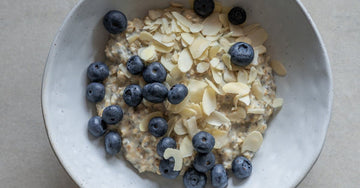 Fit person making healthy sugar-free breakfast in sunny kitchen